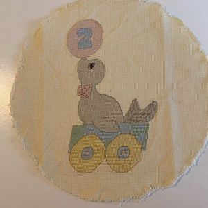 Finished Cross Stitch circus seal 10in circle muted pastel handmade nursery cute